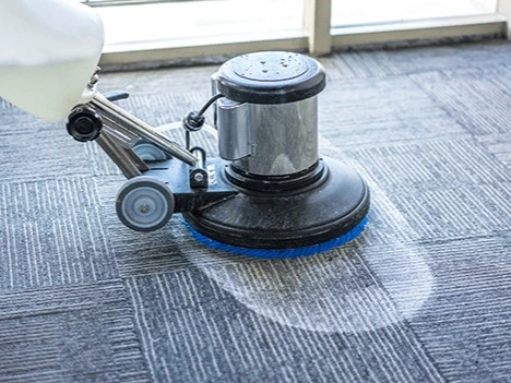 Carpet cleaning machine on carpet